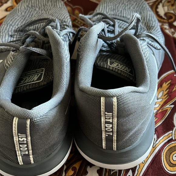 A ladies pair of Gray Nike Flex Supreme Tr6. Good condition. No stains or holes. - Picture 2 of 5
